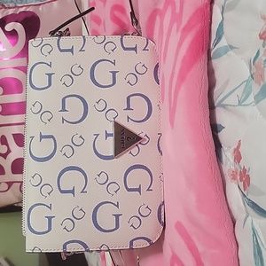 Guess crossbody (white with blue Gs).